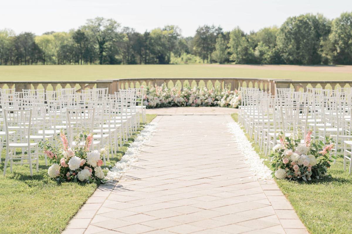 South Courtyard ceremony lawn with stone balustrades overlooking rolling hills