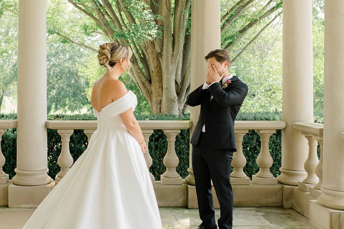 Elena and David by the limestone fountain in the North Courtyard